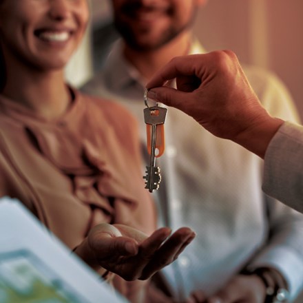 First home buyer receiving house key