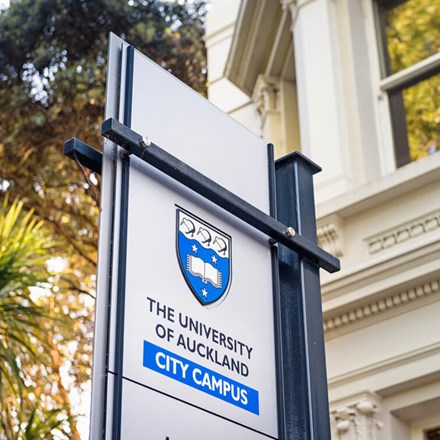 University of Auckland signage from below.