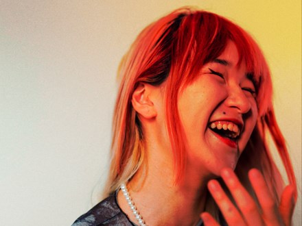 Red headed woman laughing