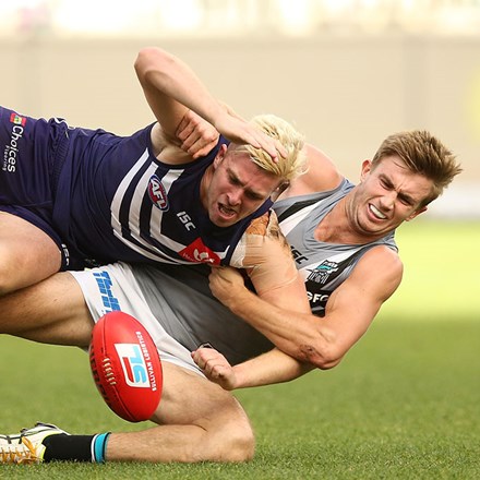 AFL players in action. 