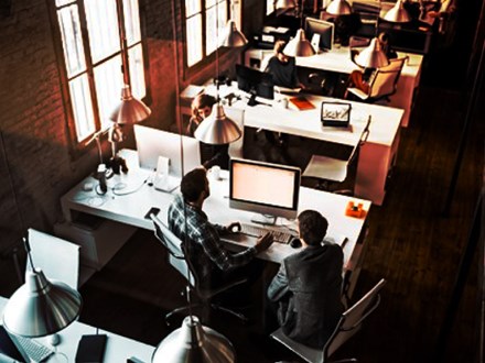 Top view of workers in an open plan office