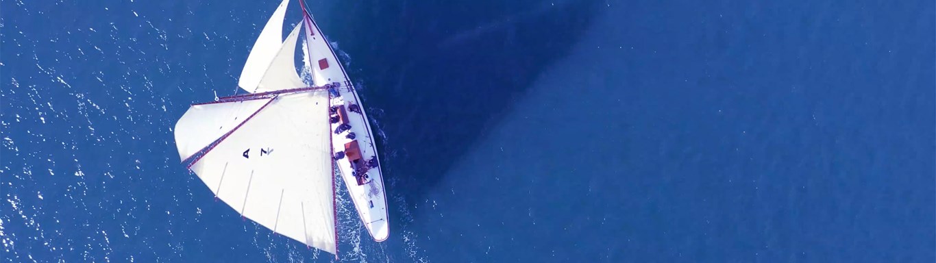 Yacht top view on water
